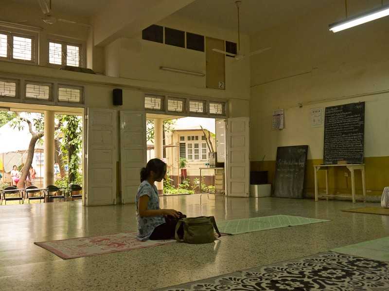 Yoga mats and sitting person